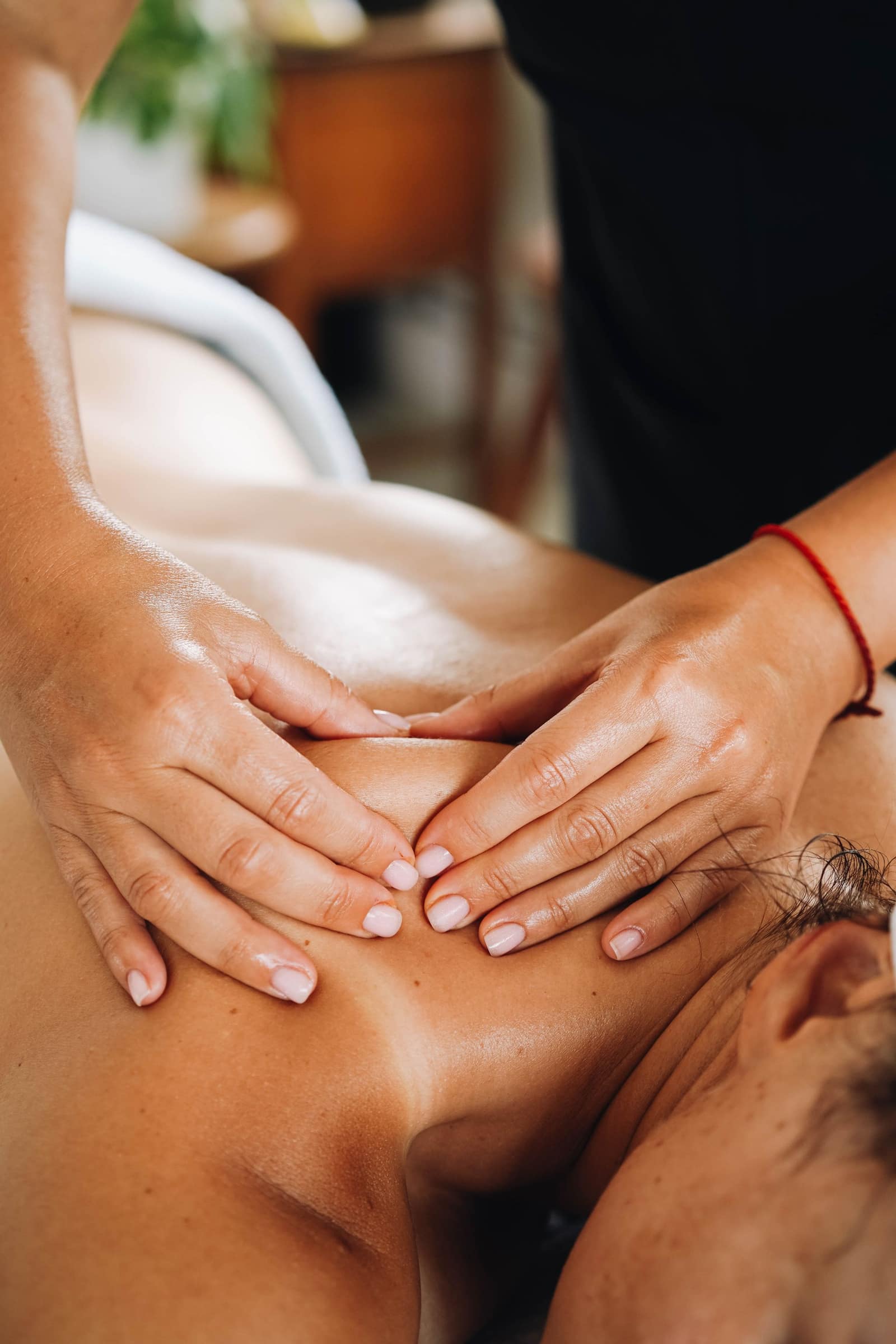 A member relaxes into a spa massage, the appointment found and, on their approval, booked to fit neatly around their week.